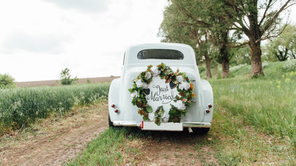 Vintage wedding car, white. Just Married written on the back